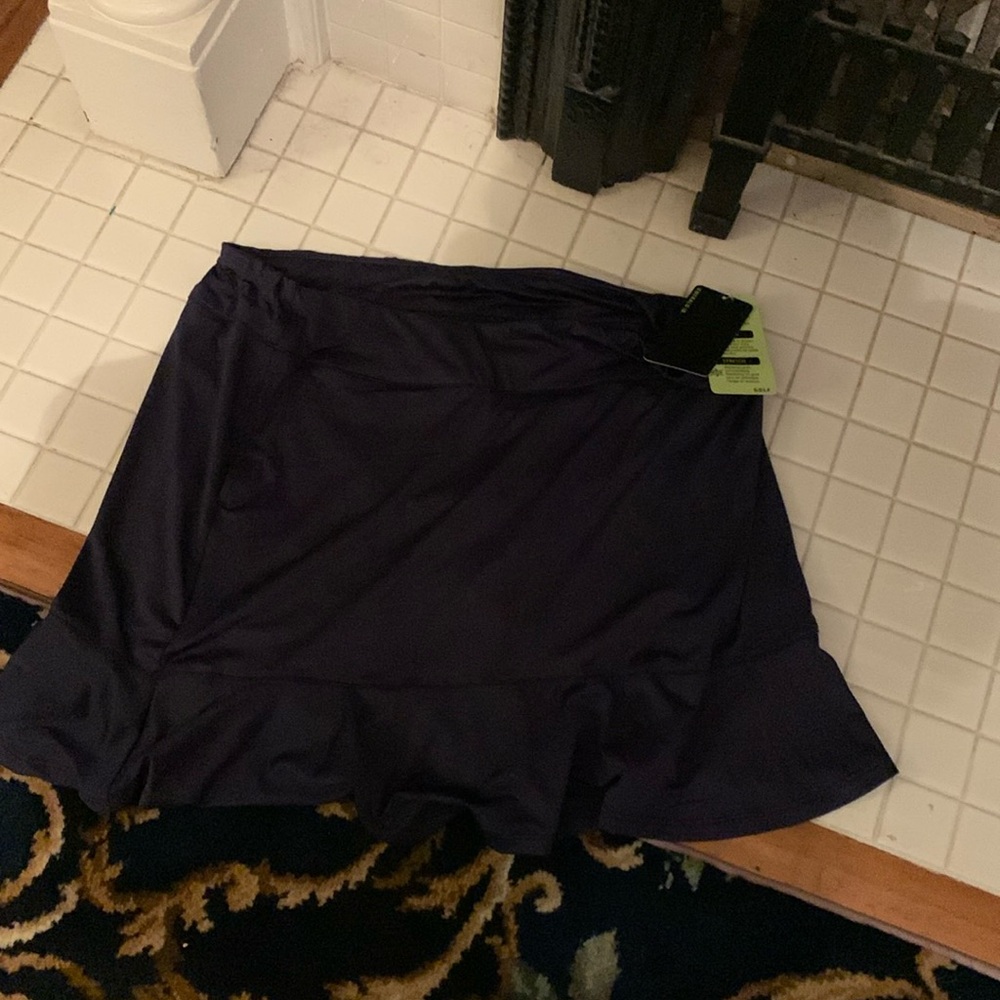 Emerald 18 ruffle bottom golf‎ skort. NWT. Retail 38